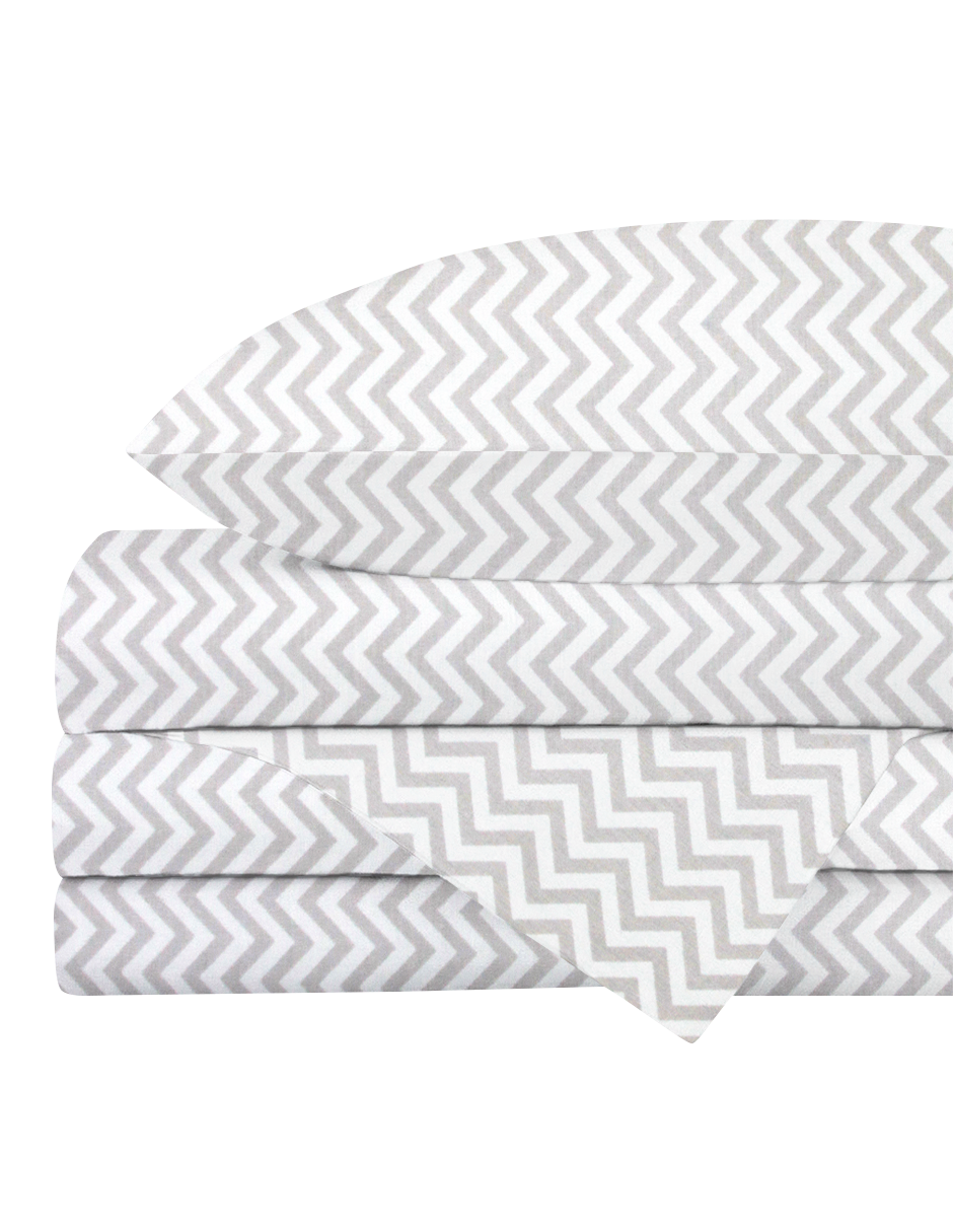 Cuna de 130x70 con la sábana de cajón Nap Baby Chevron Gris de algodón bien ajustada, la encimera doblada a los pies y la funda a juego.