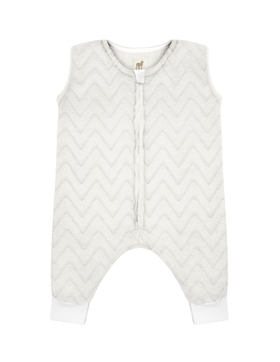 Bebé dormido con saco de dormir afelpado Nap Baby Zig Zag Off-White con abertura para pies y cierre frontal
